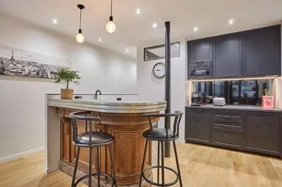 Cuisine ou kitchenette dans l'établissement Apartment in the Center of Paris by studioprestige