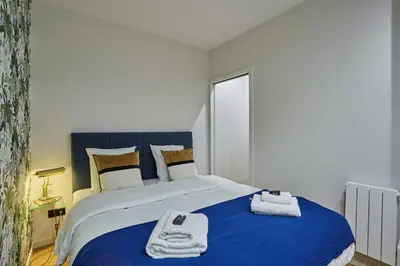 Un ou plusieurs lits dans un hébergement de l'établissement Apartment in the Center of Paris by studioprestige