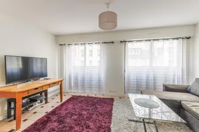 Télévision ou salle de divertissement dans l'établissement Cosy family flat