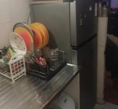 Cuisine ou kitchenette dans l'établissement Charmant studio