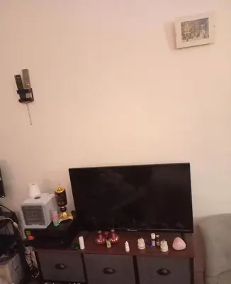 Télévision ou salle de divertissement dans l'établissement Charmant studio