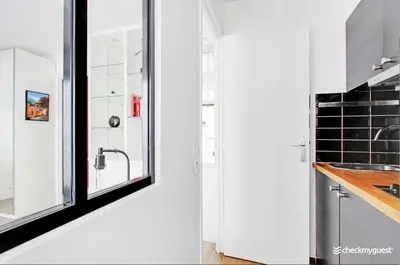Cuisine ou kitchenette dans l'établissement Cosy studio - 2P - Trocadero