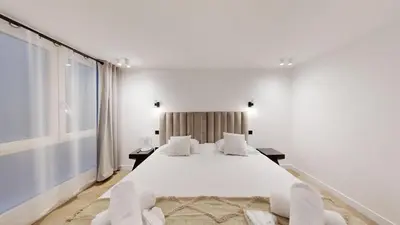 Un ou plusieurs lits dans un hébergement de l'établissement Bluestay 191 - Charmant appartement à Paris