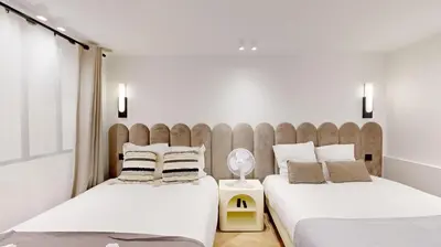 Un ou plusieurs lits dans un hébergement de l'établissement Bluestay 191 - Charmant appartement à Paris