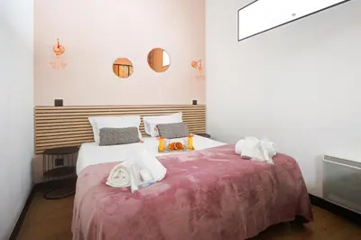 Un ou plusieurs lits dans un hébergement de l'établissement Bluestay 60 - Superbe appartement à Paris