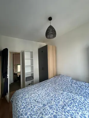 Un ou plusieurs lits dans un hébergement de l'établissement Appartement Porte de Versailles