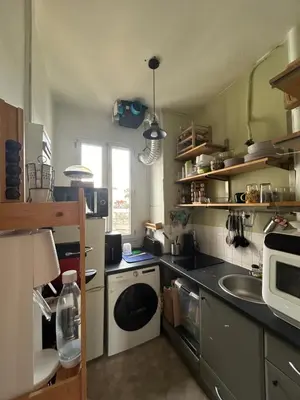 Cuisine ou kitchenette dans l'établissement Appartement Porte de Versailles