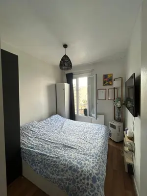 Un ou plusieurs lits dans un hébergement de l'établissement Appartement Porte de Versailles