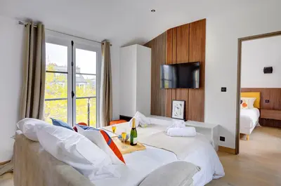 Un ou plusieurs lits dans un hébergement de l'établissement Bluestay 296 - Superbe appartement à Paris 17
