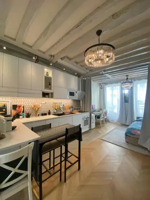 Cuisine ou kitchenette dans l'établissement Appartement cosy à Saint Michel-Notre Dame Paris Center