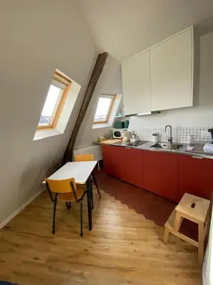 Cuisine ou kitchenette dans l'établissement Studio Victoria - Centre de Paris