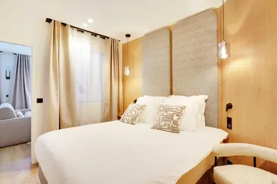 Un ou plusieurs lits dans un hébergement de l'établissement Beautiful Apartment - 1BR-4P - Le Marais