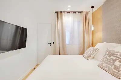 Un ou plusieurs lits dans un hébergement de l'établissement Beautiful Apartment - 1BR-4P - Le Marais