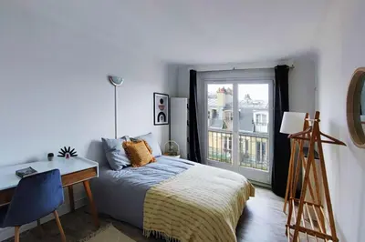 Un ou plusieurs lits dans un hébergement de l'établissement Flexliving - room - Villon