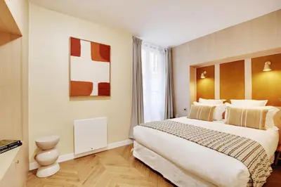 Un ou plusieurs lits dans un hébergement de l'établissement ONIRI - Serviced Apartment in Place Vendôme