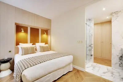 Un ou plusieurs lits dans un hébergement de l'établissement ONIRI - Serviced Apartment in Place Vendôme