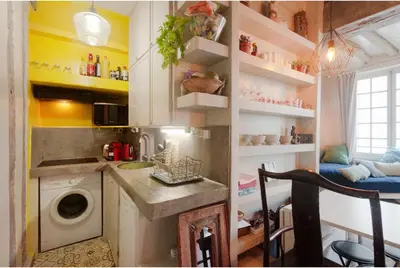 Cuisine ou kitchenette dans l'établissement Appartement île Saint-Louis