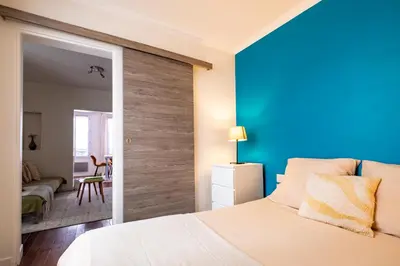Un ou plusieurs lits dans un hébergement de l'établissement Charming Apartment in heart of Paris