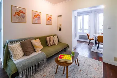Coin salon dans l'établissement Charming Apartment in heart of Paris
