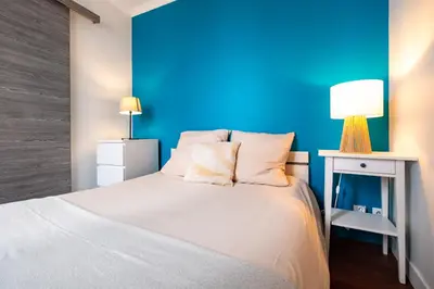 Un ou plusieurs lits dans un hébergement de l'établissement Charming Apartment in heart of Paris