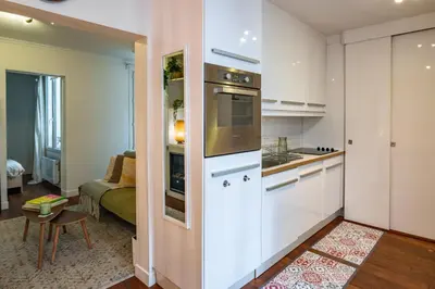 Cuisine ou kitchenette dans l'établissement Charming Apartment in heart of Paris