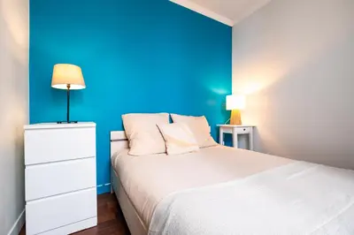 Un ou plusieurs lits dans un hébergement de l'établissement Charming Apartment in heart of Paris