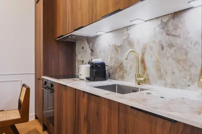 Cuisine ou kitchenette dans l'établissement Cosy flat - 1BR- 4P - Arc de Triomphe