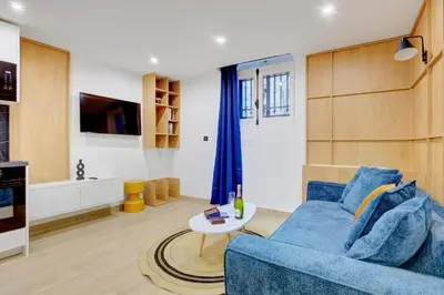 Télévision ou salle de divertissement dans l'établissement Bluestay 286 - Cozy appartement à Paris