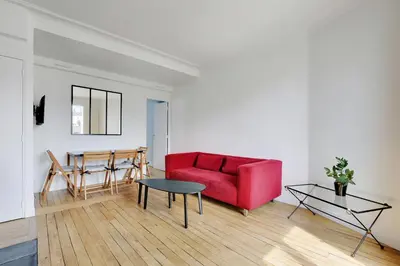 Coin salon dans l'établissement Pick A Flat's Apartment in Ternes - Arc de Triomphe