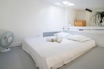 Un ou plusieurs lits dans un hébergement de l'établissement Studio de Bourgoin - Welkeys