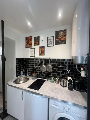Cuisine ou kitchenette dans l'établissement Home Sweet Home Batignolles 1 Bedroom - N37