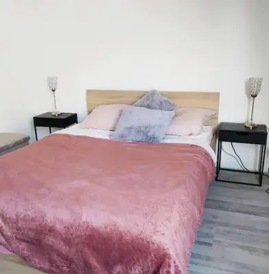Un ou plusieurs lits dans un hébergement de l'établissement Superb modern apartment