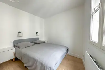 Un ou plusieurs lits dans un hébergement de l'établissement Flexliving - whole flat - Beauregard