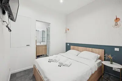 Un ou plusieurs lits dans un hébergement de l'établissement Lavie Maison I Marais & Historic & Central