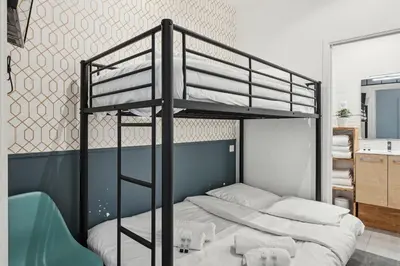 Un ou plusieurs lits dans un hébergement de l'établissement Lavie Maison I Marais & Historic & Central