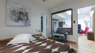Un ou plusieurs lits dans un hébergement de l'établissement 3-bedroom apartment Quai des Grands Augustins
