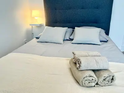 Un ou plusieurs lits dans un hébergement de l'établissement Petit appartement agréable au cœur du 11e arrondissement