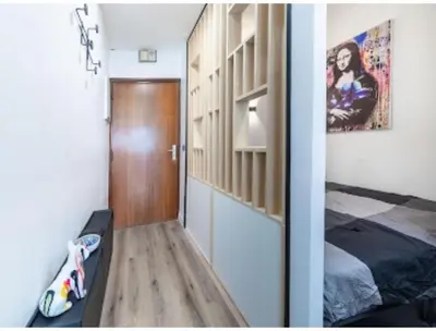 Un ou plusieurs lits dans un hébergement de l'établissement Cocon design et cosy à La Défense, vue imprenable sur Paris