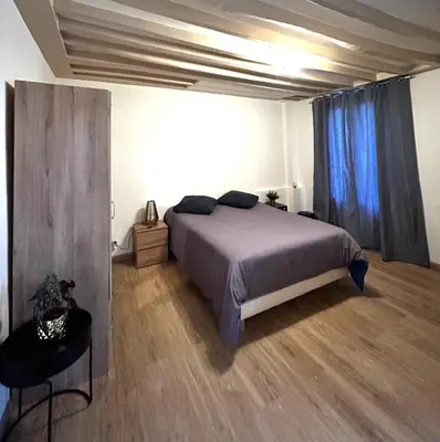 Un ou plusieurs lits dans un hébergement de l'établissement Montparnasse Studio