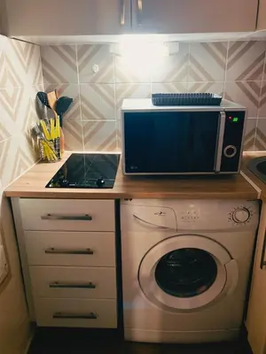 Cuisine ou kitchenette dans l'établissement Montparnasse Studio