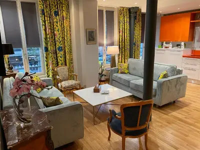 Coin salon dans l'établissement Appartement familial au coeur de Paris