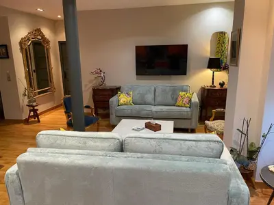 Télévision ou salle de divertissement dans l'établissement Appartement familial au coeur de Paris