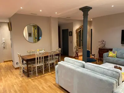Coin salon dans l'établissement Appartement familial au coeur de Paris