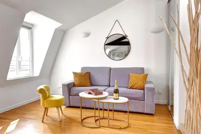 Coin salon dans l'établissement Bluestay 239 - Superbe appartement à Pigalle