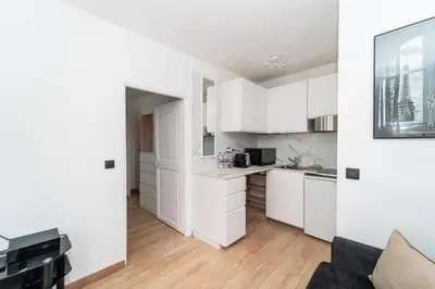 Cuisine ou kitchenette dans l'établissement Charmant 2 pièces à 2 pas du Marais