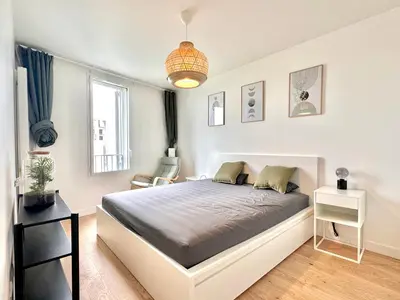 Un ou plusieurs lits dans un hébergement de l'établissement Home in Poniatowski near Vincennes Forest