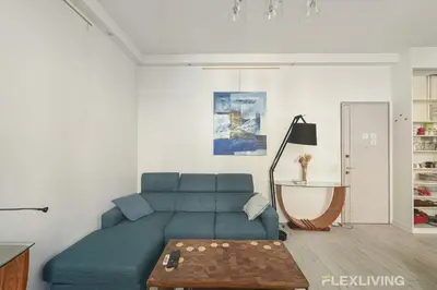 Coin salon dans l'établissement Flexliving - T2 - Servan