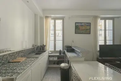 Télévision ou salle de divertissement dans l'établissement Flexliving - T2 - Servan
