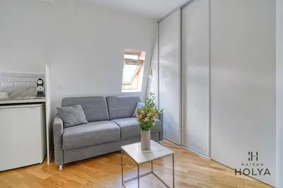 Coin salon dans l'établissement Proche Haussman - Le Mignon - 289B
