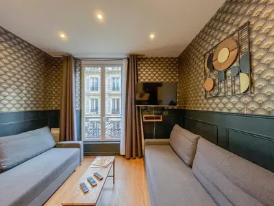 Coin salon dans l'établissement Urban Flat 18 - Charming 2BDR Parisian Home